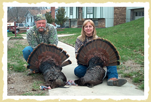 Bryan and Deb, both with successful wild turkey hunts