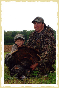 Proud turkey hunter Lake and his dad, Corey